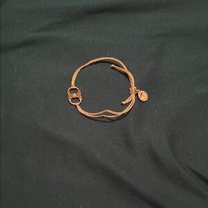 Elegant Tory Burch “Embrace Ambition” Gold-Tone Limited Edition Bracelet